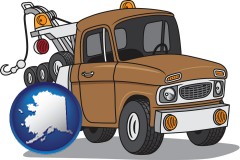 alaska map icon and an automobile tow truck