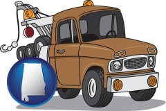 alabama map icon and an automobile tow truck