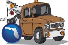 florida map icon and an automobile tow truck