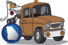 georgia map icon and an automobile tow truck